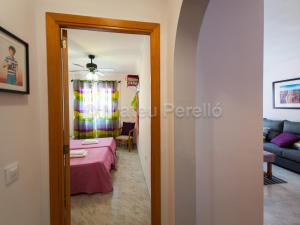 Postel nebo postele na pokoji v ubytování Apartamentos Obelisc