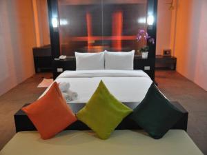 Ένα ή περισσότερα κρεβάτια σε δωμάτιο στο Khun Chaweng Resort