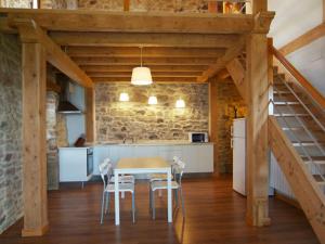Kuchyň nebo kuchyňský kout v ubytování Apartamentos Lusarbe