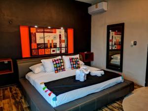 Llit o llits en una habitació de Bahia Tolok