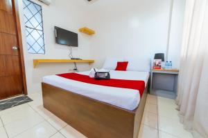 TV a/nebo společenská místnost v ubytování RedDoorz Plus @ Casa Lucia Sindalan San Fernando City Pampanga