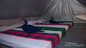 Un ou plusieurs lits dans un hébergement de l'établissement Sigiri Jungle Camping