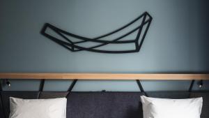 Postel nebo postele na pokoji v ubytování Nest Hotel Osaka Umeda