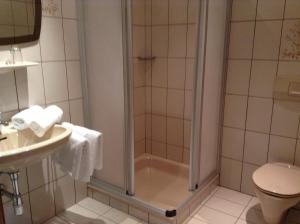 Koupelna v ubytování Appartements Basti