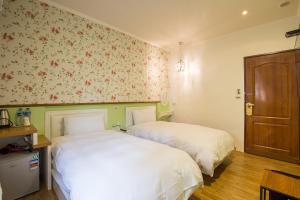 Postel nebo postele na pokoji v ubytování N. Castle Hotel