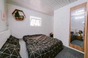 Postel nebo postele na pokoji v ubytování BKV Homestay