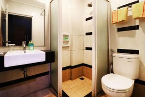 Koupelna v ubytování Bendungan Hilir Residence + 27 fotografií