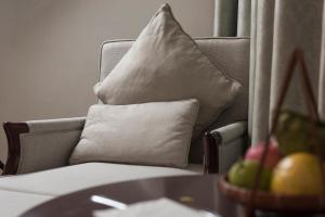 Postel nebo postele na pokoji v ubytování Zhejiang Xizi Hotel