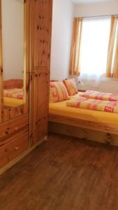 Postel nebo postele na pokoji v ubytování Almhaus Blümel