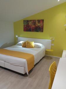 Letto o letti in una camera di Suite Color Verona