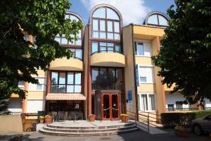 Budova, kde se aparthotel nachází