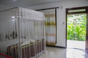 Letto o letti in una camera di Sigiriya Mana B&B