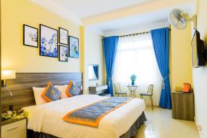 Voodi või voodid majutusasutuse VF Hotel Dalat toas