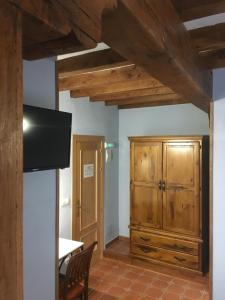 TV a/nebo společenská místnost v ubytování Casa Los Laureles + 30 fotografií