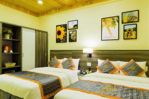 Voodi või voodid majutusasutuse VF Hotel Dalat toas
