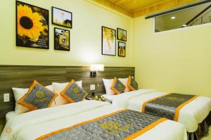 Voodi või voodid majutusasutuse VF Hotel Dalat toas