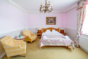 Posteľ alebo postele v izbe v ubytovaní Hotel Garden