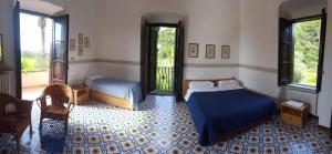 Katil atau katil-katil dalam bilik di Il Casino Di Mare - Dimora Storica
