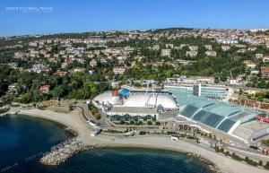 an aerial view of a building next to the water at Guesthouse Totićevi in Rijeka