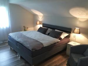 Postel nebo postele na pokoji v ubytování Alpila Brand