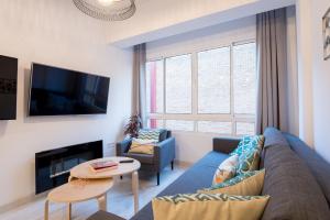 Televízia a/alebo spoločenská miestnosť v ubytovaní Nuevo centro 3 hab 2 baños ac wifi