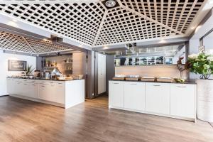 Eldhús eða eldhúskrókur á Hotel Le Val D'arimont