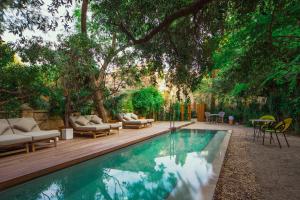 Bazén v ubytovaní Can Bordoy Grand House Hotel GL Preferred Hotel alebo v jeho blízkosti