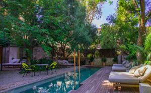 Bazén v ubytovaní Can Bordoy Grand House Hotel GL Preferred Hotel alebo v jeho blízkosti