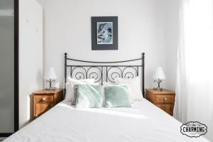 Postel nebo postele na pokoji v ubytování Antiques Market - Apartamento de 3 dormitorios con Parking