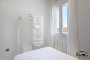 Postel nebo postele na pokoji v ubytování Antiques Market - Apartamento de 3 dormitorios con Parking