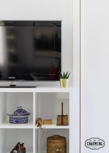 TV a/nebo společenská místnost v ubytování Antiques Market - Apartamento de 3 dormitorios con Parking