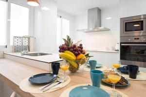 Kuchyň nebo kuchyňský kout v ubytování Centrico apartamento 2 dorm