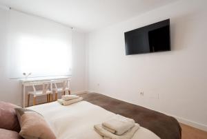 Postel nebo postele na pokoji v ubytování Centrico apartamento 2 dorm