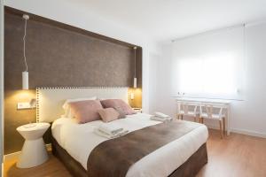 Postel nebo postele na pokoji v ubytování Centrico apartamento 2 dorm
