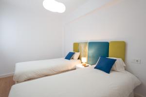 Postel nebo postele na pokoji v ubytování Centrico apartamento 2 dorm