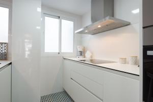 Kuchyň nebo kuchyňský kout v ubytování Centrico apartamento 2 dorm
