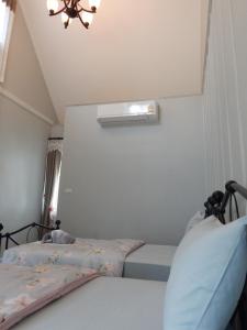 Postel nebo postele na pokoji v ubytování Sky cottage Bungalow