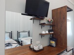 TV a/nebo společenská místnost v ubytování Sky cottage Bungalow