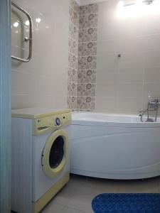 Ένα μπάνιο στο Apartamenty Otel36 Leninskiy Prospekt