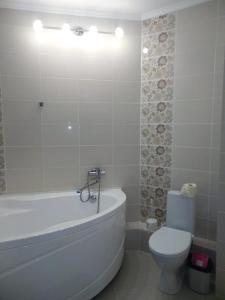 Ένα μπάνιο στο Apartamenty Otel36 Leninskiy Prospekt