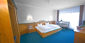 Voodi või voodid majutusasutuse Hotel Brunella toas