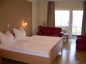 سرير أو أسرّة في غرفة في Hotel-Restaurant Sälzerhof