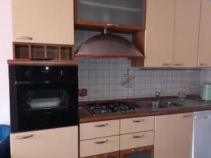 A kitchen or kitchenette at Checchi House