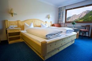 Voodi või voodid majutusasutuse Hotel Brunella toas