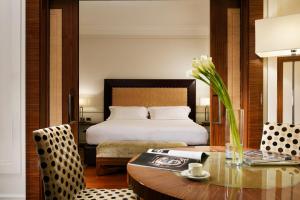 Cama ou camas em um quarto em UNA HOTELS Decò Roma mais 27 fotos