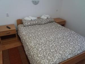 Ένα ή περισσότερα κρεβάτια σε δωμάτιο στο Vila Vuk Wolf