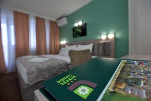 Postel nebo postele na pokoji v ubytování Hotel Livade