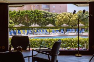 A piscina localizada em Axis Vermar Conference & Beach Hotel ou nos arredores