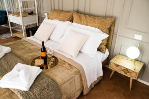 Postel nebo postele na pokoji v ubytování Diodorus Luxury Experience
