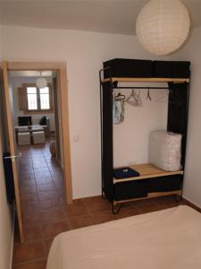 Un pat sau paturi într-o cameră la Casa cala del plomo +14 fotografii